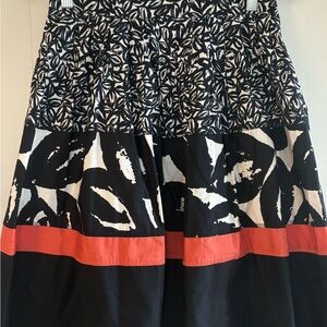 DKNY navy/ orange patterned midi skirt w pockets, size 2, cotton, top condition
